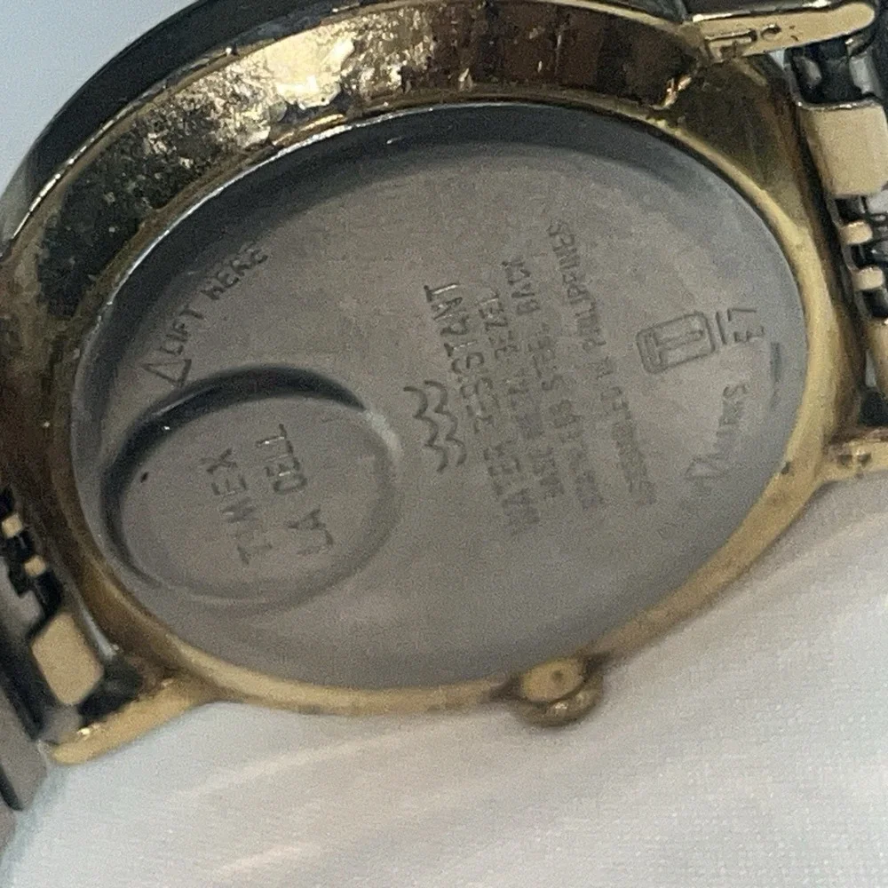 Vintage Gold Band Timex Watch. LA CELL. White Face. Metal Band. Needs Battery‎